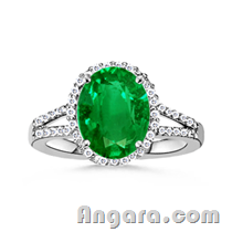 Oval Emerald and Diamond Split Shank Ring