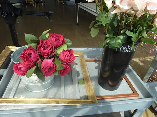 Some roses and the frames we used around our escort card display.