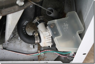 Clean cover installed above pump IMG_2777