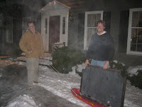 Ryan and Rob moving the pool table slate by sled  in centreville - this was the end of a very long day