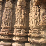 Various Shiva images, all in exact same postures. Shown with four hands, carrying trisula, snake and kamandalu. One hand is in varada posture. Nandi shown sitting at the base, near Shiva's feet.