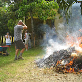 Burning the pile of leaves.
