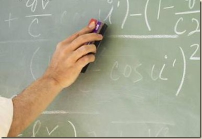 Professor erasing formulae on blackboard