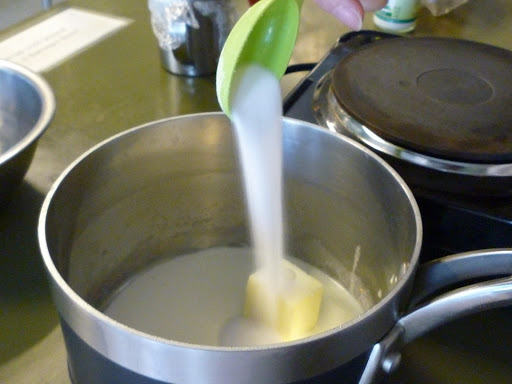 Sugar and butter added to the cream