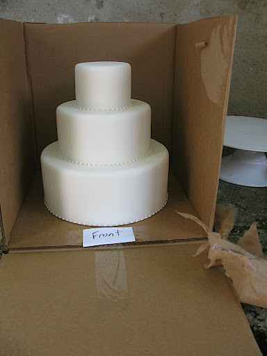 Mark Joseph Cakes covered a three-tier confection in fondant for us (little beads were piped around the base of each layer). Their work is always pure perfection. It smelled so sweet!
