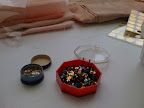 We used lots of multi-colored sequins. Here they're stored in these fab vintage containers.
