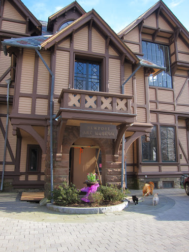 The art museum is in the John N. A. Griswold house, which is an American Stick style building.  Stick style is made notable by the many trusses, gables and decorative shingles affixed to the house.