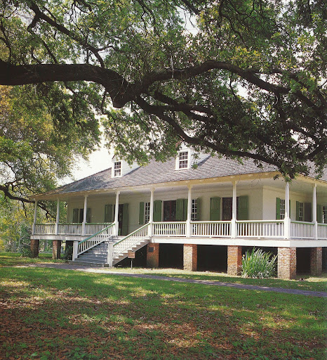 I love the wrap-around porch on the Magnolia Mound estate built in 1791. I love the wrap-around porch on the Magnolia Mound estate built in 1791.