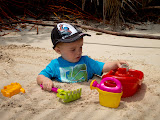 But with his toys nearby, he didn't mind at all being buried, and he went right back to playing! Madagascar6 - 053.jpg