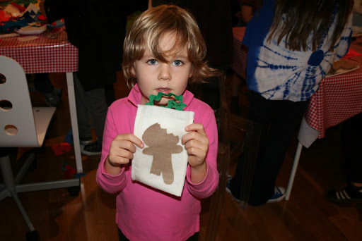 We loved that a lot of the kids crossed some of the crafts. This little boy took the felt bags and decorated it with a gingerbread man.