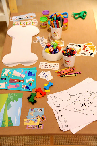 We had dog stickers from Mrs. Grossmans, paw stamps and dog placemats to decorate from Oriental Trading, cookie cutters from birthdayexpress.com, and bone crayons from Celebrate Express.