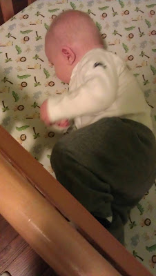 trying to roll into his stomach