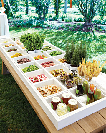 Serving luncheon entrees or crudite in these white boxes make such a chic and modern buffet setting. (marthastewartweddings.com) Serving luncheon entrees or crudite in these white boxes make such a chic and modern buffet setting. (marthastewartweddings.com)