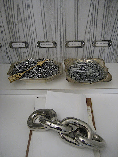 Push pins and paper clips are always in demand to pin up and put together inspiration for meetings and presentations. I like to keep them out of my desk drawer and stored in pretty containers. The chain links are my paperweight.