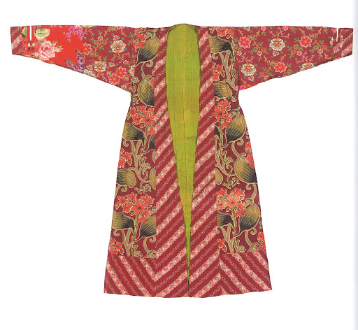 This woman's munisak from Uzbek was created with chartreuse handwoven silk and four other lavish patterned cloths. This woman's munisak from Uzbek was created with chartreuse handwoven silk and four other lavish patterned cloths.