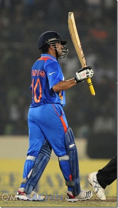 Sachin Tendulkar gestures after scoring a half century © Getty Images