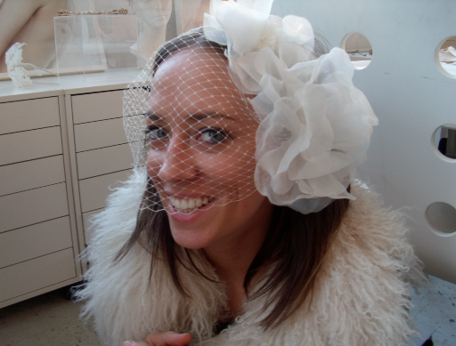 Melissa shows off a piece from the latest bridal collection.