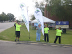 Henderson, NC YMCA Volunteers welcoming Cycle NC 2011 riders with Cow Bells!
