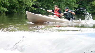 2 guys who are not members of the HRCKC trying to get enough speed to go over the dam below Ramapo Reservation and not get caught in the hydrolic.