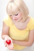 [8999635-beautiful-lady-holding-heart%255B3%255D.jpg]