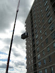 Crane lifting the panels near the Catarqui Town Centre.