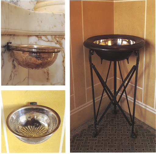 Gorgeous silver wall-mounted soap dishes and a free-standing wash basin.