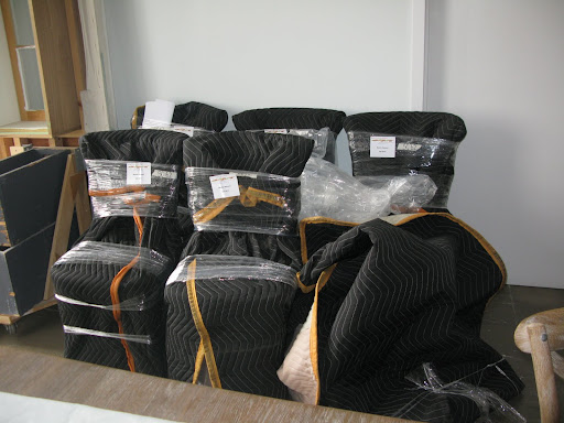 These chairs, all wrapped for a safe delivery, were destined for our photo shoot.