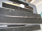 This is our black floor. We have a whole hallway of floor boards and they roll them into the studio on a cart to assemble in front of our set.