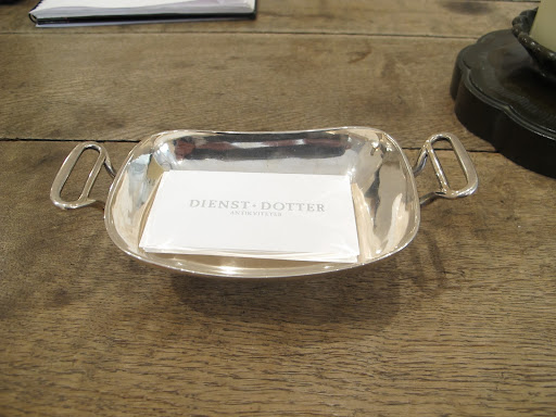 She even has the perfect silver vessel for her cards.