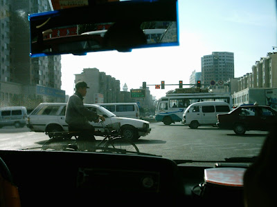 from the back of a taxi on changchun dajie