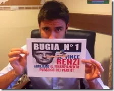 Di Battista con il cartello anti Renzi