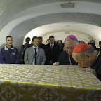 2011 Archbishop of Krakow, and former John Paul II secretary Stanislaw Dziwisz, right, kisses the coffin of late Pope John Paul II prior to be transferred before the tomb of St. Peter.jpg