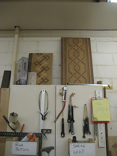A collection of tools. Check out the inlays on top of the cabinet.