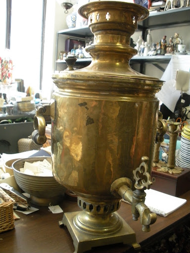 This is a Russian samovar. It is traditionally used to heat and serve tea, but I think it looks great even when it's not being used.