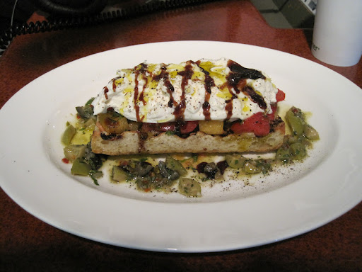 Burrata with Heirloom Tomatoes, Whole Tapenade and Grilled Bread by Manuel Trevino