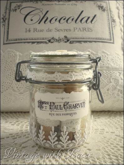 Altered jar with lace and French label Altered jar with lace and French label