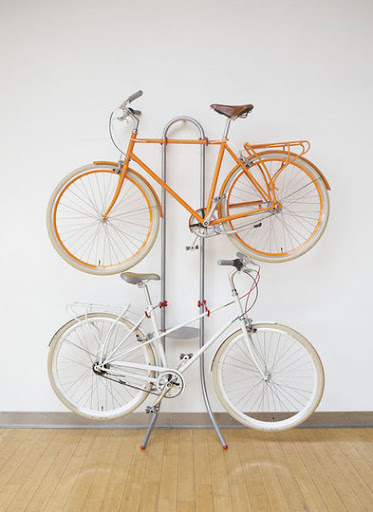 I love the loop at the top of this bike shelf. (Michelangelo bike rack, apartmenttherapy.com)