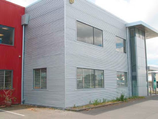 This cladding was painted with an Acrylic Metallic Coating to imitate the existing Lucabond Aluminium cladding.