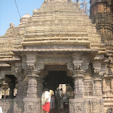 The upper structure, in yellow stone, is seems to be a recent addition. The miniature images on this structure are very inferior in craftsmanship.