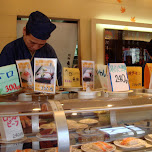 convey belt sushi chef in Shinjuku, Japan 
