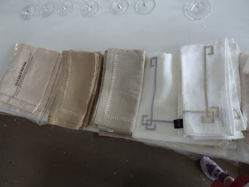 An array of Kim Seybert napkins, all of which had metallic thread detailing.