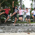 Brewing Department staff jumping for joy in Babu Santa Beach Resort, Talikud Island