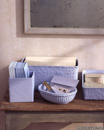 Turn empty gift baskets into stylish household organizers. (Similar receptacles are sold at floral shops and crafts stores if you need to supplement your supply.) Unify the mismatched containers by coating them with a single color of latex paint; dry overnight. (marthastewart.com) Turn empty gift baskets into stylish household organizers. (Similar receptacles are sold at floral shops and crafts stores if you need to supplement your supply.) Unify the mismatched containers by coating them with a single color of latex paint; dry overnight. (marthastewart.com)