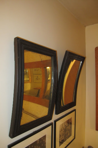 Look at these convex and concave mirrors I found in the shop.