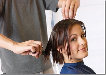 Woman getting a haircut