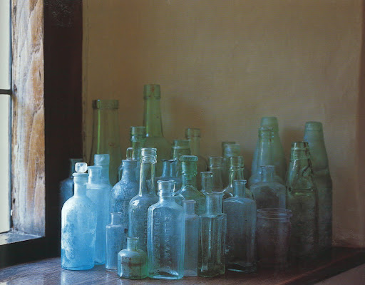 From a Tudor mansion house, a collection of bottles; remnants from the estate's past.