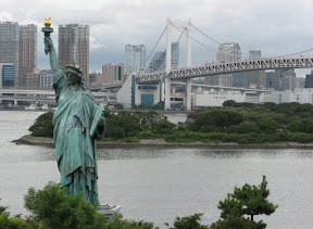 Odaiba statue of liberty, and rainbow bridge.
