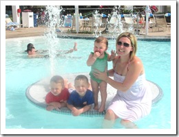 Florida vacation at condo Trish and kids in the pool near fountain