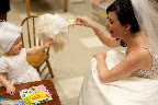 No one can resist the bouquet—least of all, my flower girl!