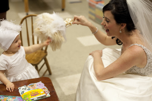 No one can resist the bouquet—least of all, my flower girl!